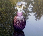 Bottle, Perfume, Amethyst with ground glass stopper half oz.