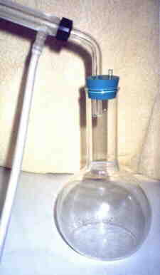 The receiver flask with condenser attached